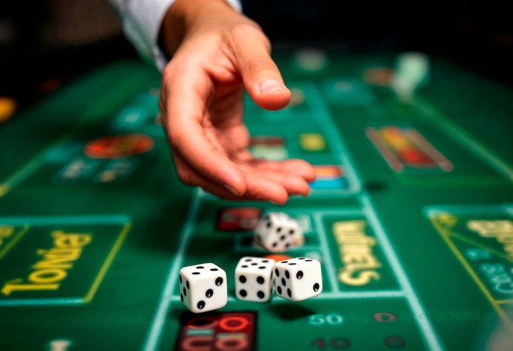 Panel kontrol Fishing Games menunjukkan pilihan taruhan dan tombol aktivasi